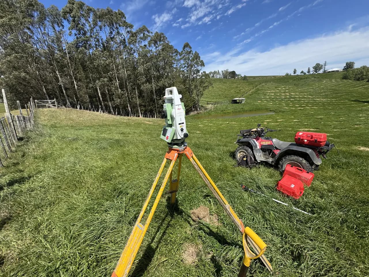 Foresight Surveying total station and quad bike on rural farmland